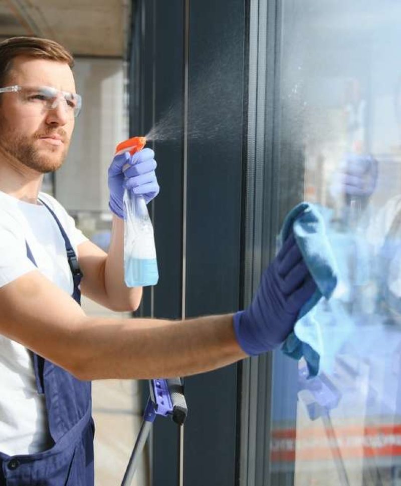 Male,Professional,Cleaning,Service,Worker,In,Overalls,Cleans,The,Windows