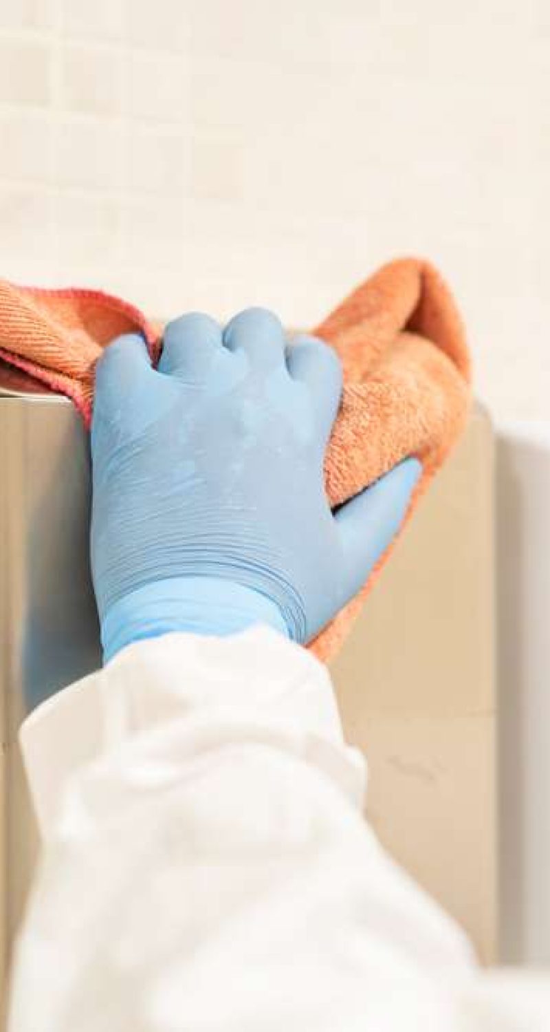 Cleaning,Staff,Disinfecting,The,School's,Soap,Dispensers,To,Prevent,Covid19