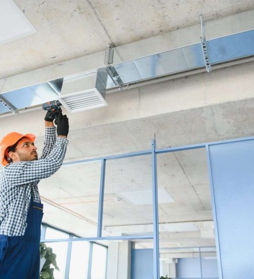 hvac_technician_cleaning_vent