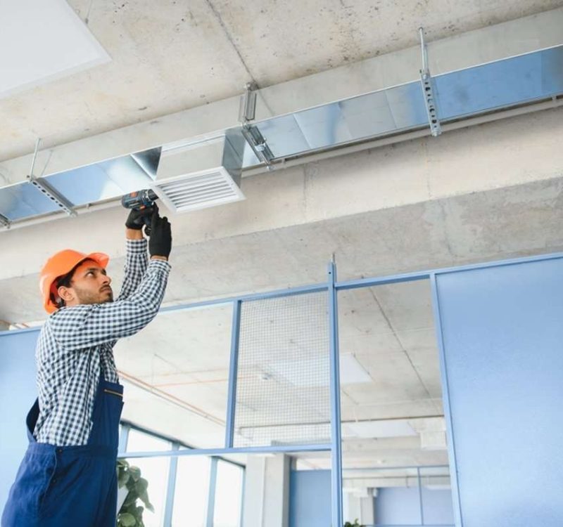 hvac_technician_cleaning_vent